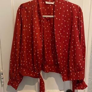 Red wrap blouse with white print